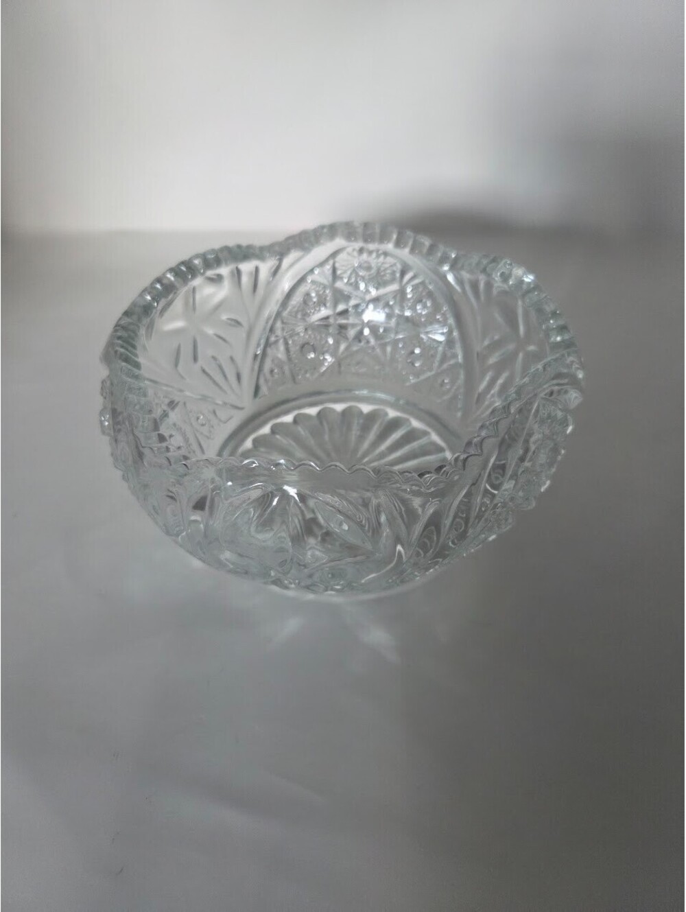Pressed Cut Glass Bowl with Scalloped Rim and Starburst Pattern 7.5 in Diameter